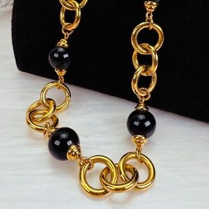 Vintage Monet weighted, goldtone and black chain, long Necklace